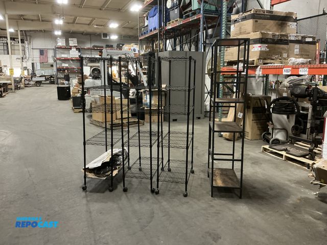 Lot 2-74579 - Lot of (4) shelving racks including 3 Metal racks measuring 30 x 14 x 61. The rack with wooden shelv...