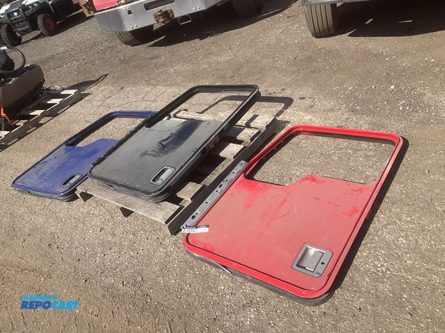 Lot 2-11747 - (3) used Kenworth driver side doors, one has the window and part of the interior panel, scattered sc...