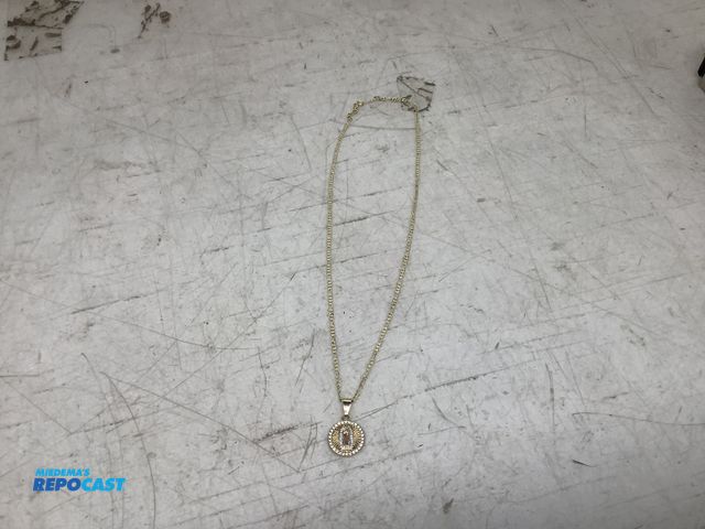 Lot 2-74006 - New Gold (crystal rim) saint pendant with a alternating circle and oval chain