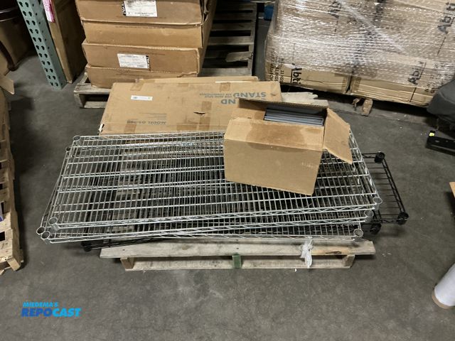 Lot 2-23934 - Skid lot of multiple metal shelves in various sizes (only shelves), J-boxes, and air conditioner bra...