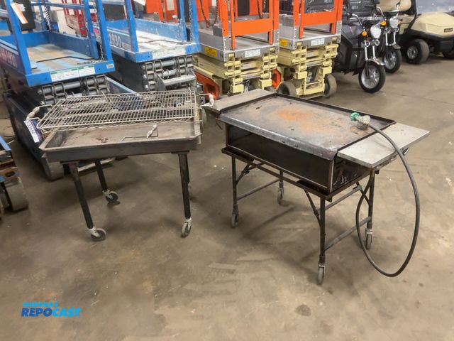 Lot 2-33684 - Lot of (1) Used 3’ Charcoal Grill on Casters and (1) 3’ Propane Flat Top Griddle on Casters, both sh...