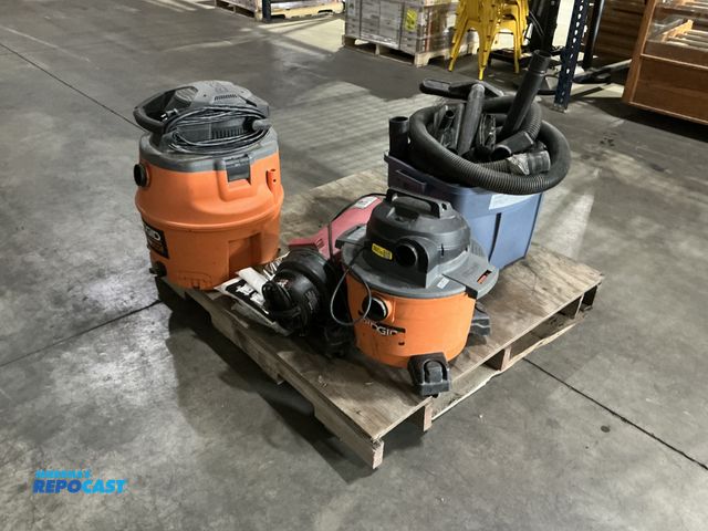 Lot 2-27273 - Pallet of 3 assorted sized Used rigid and hang up Shop Vacs with Tote of Accessories (came from a wo...