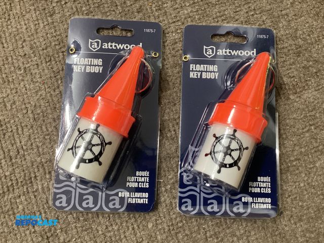 Lot 2-34600 - Two new attwood Floating Key Buoys. Cover snaps tight for storage of small items.