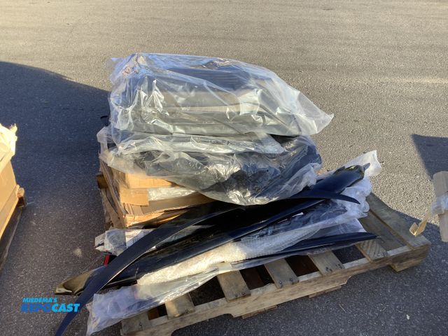 Lot 2-76337 - Skid lot of assorted vehicle parts and accessories including: window visors, bug reflectors, various...