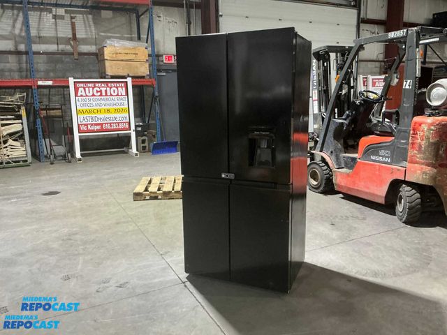 Lot 2-60517 - Large Black Refrigerator/Freezer
