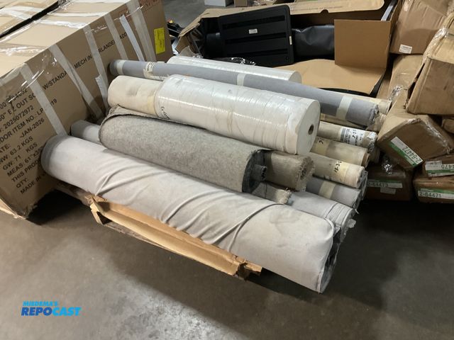 Lot 2-27751 - Skid of various sized assorted rolls of fabrics, colors: white shades of grey, shades of tan, widths...