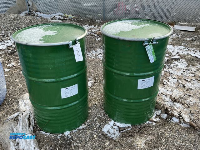 Lot 2-63367 - Lot of (2) 55gal. green steel barrels w/ removeable lid and locking rings - Clean apple juice