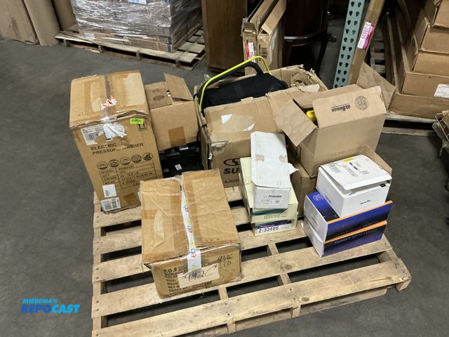Lot 2-23937 - Skid lot of various items: jeans, pressure washer, lawn dethatcher/scarifier, cleaning supplies, out...