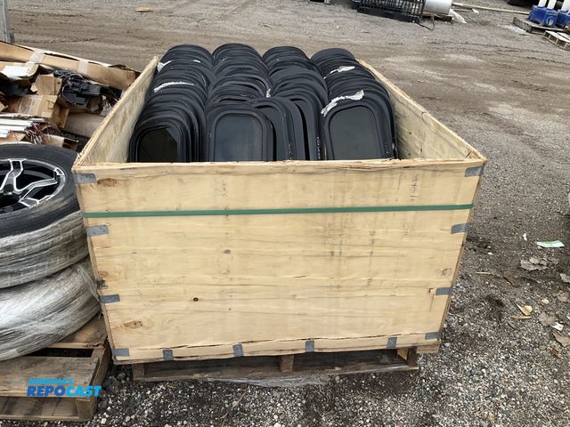 Lot 2-94924 - Crate lot of black RV circular windows 31” x 11”