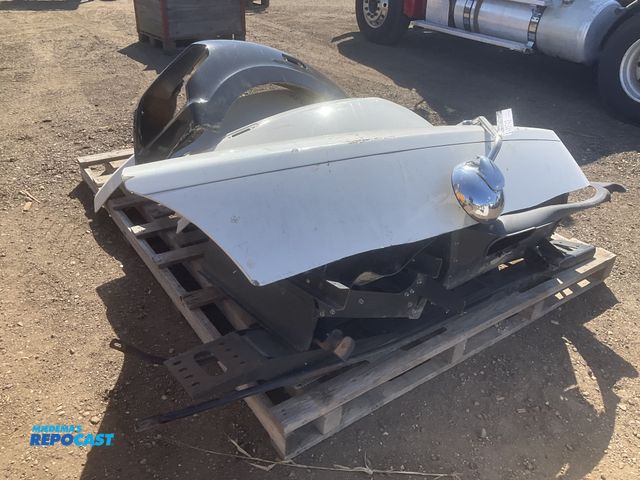 Lot 2-11742 - Skid of misc truck parts including fiberglass fenders, intercooler, some radiators, and some battery...