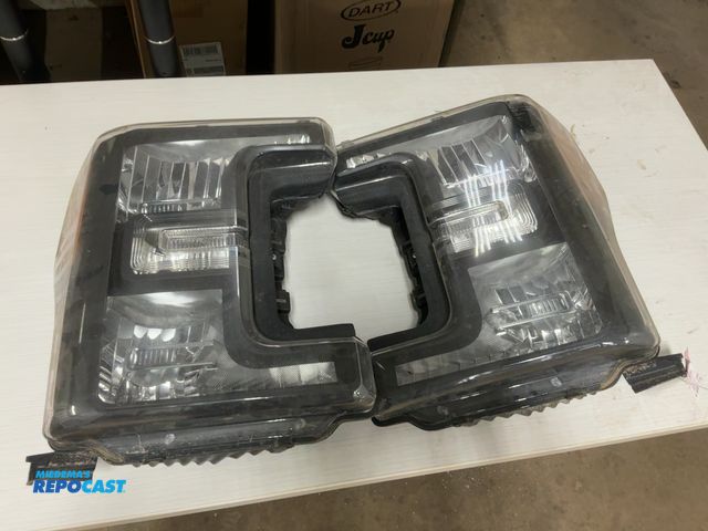 Lot 2-23277 - (2) Used Aftermarket Headlights off a 2017 Ford F-250 Super Duty Truck, one has scratches, adjusters...