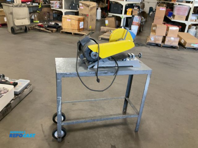 Lot 2-33515 - 7" abrasive metal saw with 1 extra disc and has a Gould century motor, size: 36”x14.5”x50”H