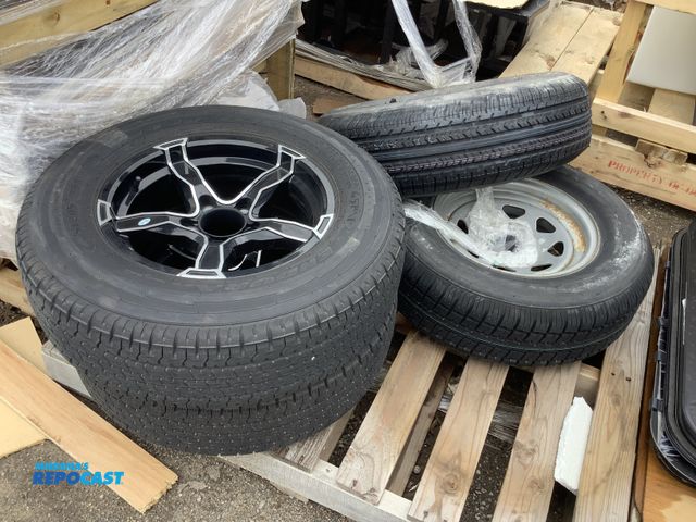 Lot 2-93681 - Skid with (2) Goodyear Endurance ST205/75R15 Tires w/ Rims and (2) Hispec Oracle ST225/75R15 Tires w...