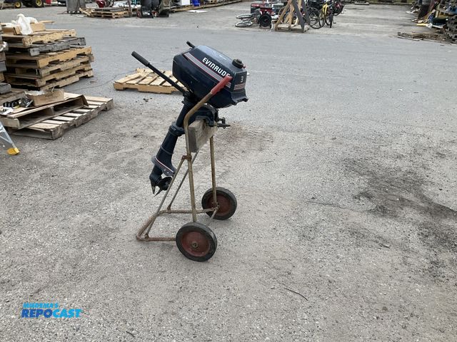 Lot 2-35314 - Evinrude blue 3hp outboard boat Motor - includes portable boat stand has good compression