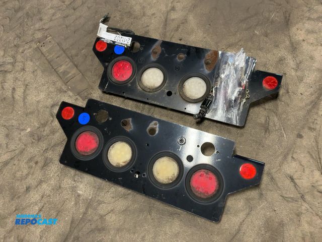 Lot 2-11203 - Lot of (2) Black Rear Semi Tail Light Brackets, 34-1/4" wide, come with (2) loose gladhands