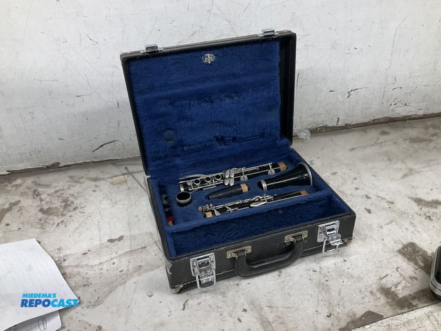 Lot 2-23837 - Bundy Resonite Clarinet and TE Olds, in case.