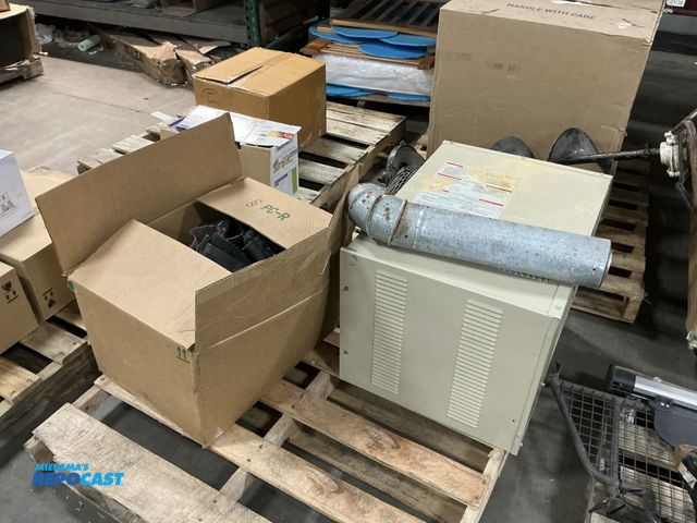 Lot 2-23818 - Lot of various sized boots, and a mr heater ceiling mount with propane conversion inside