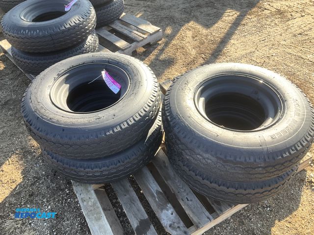 Lot 2-23682 - (4) 8-14.5 tires on steel mobile home style wheels, used