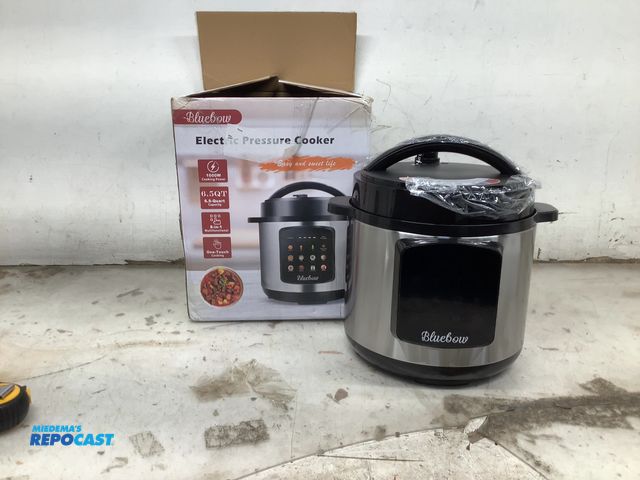 Lot 2-92379 - Bluebow Electric Pressure Cooker dent on the side
