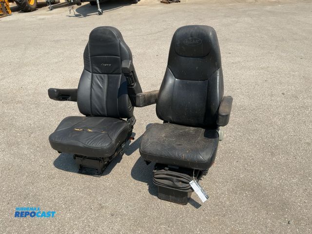 Lot 2-11118 - (2) Used Semi Truck Seats with Arm Rests and Air Ride Bases, one is a Peterbilt and One is a Legacy,...