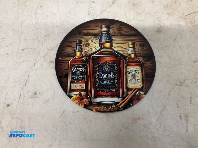 Lot 2-19672 - Daniel’s metal circular sign