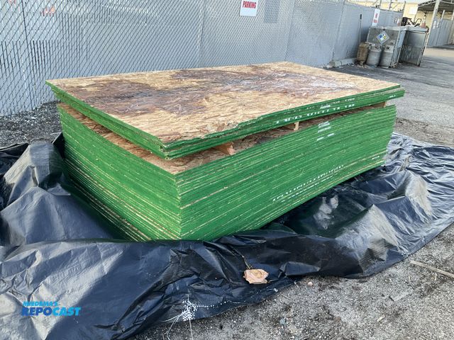 Lot 2-73251 - Skid lot assorted plywood boards with green painted sides approx. 4’ x 8’