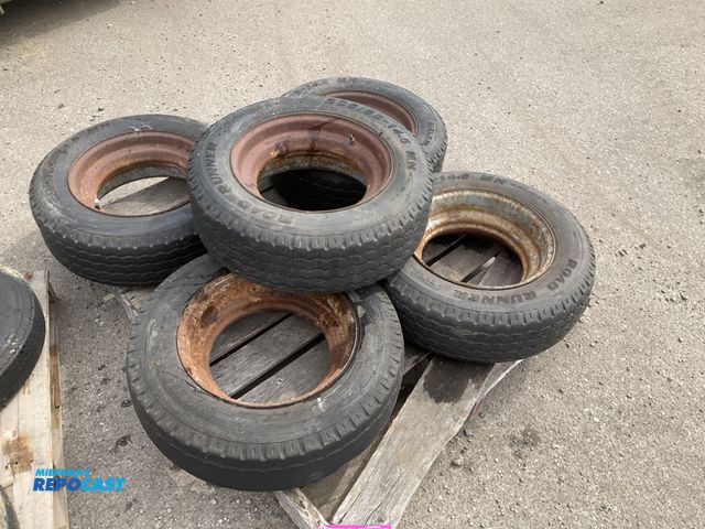 Lot 2-22781 - (5) 205/65-14.5 tires on steel mobile home style wheels, used, a couple are flat or missing valve st...
