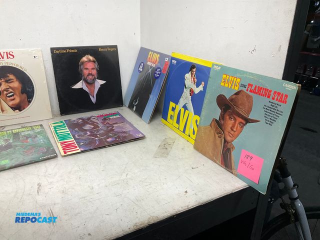 Lot 2-79950 - Box of Vintage Records and VHS Tapes