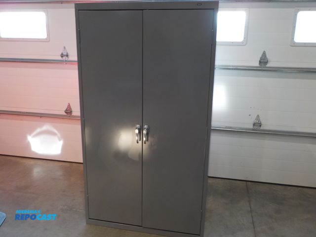 Lot 2-34141 - Tennsco two door personal storage cabinet. Three shelves. 36" w x 18" d x 64" h