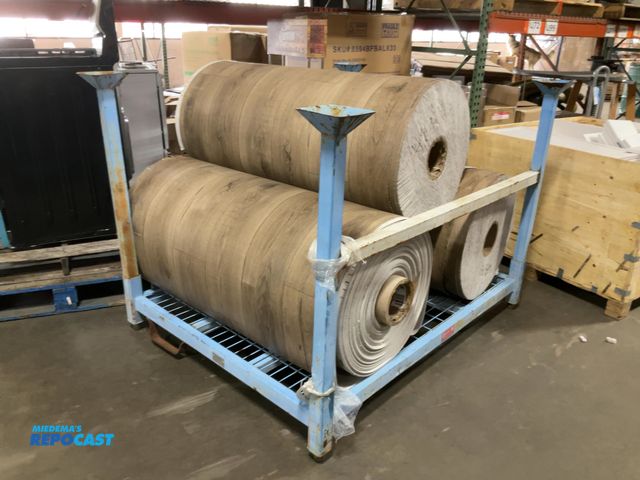 Lot 2-61953 - Heavy duty Rack of (3) large rolls of wooden flooring Lino