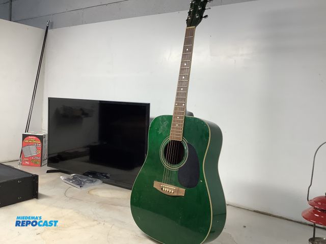 Lot 2-27348 - hondo acoustic guitar, dark green in color, 6 string, model H-350