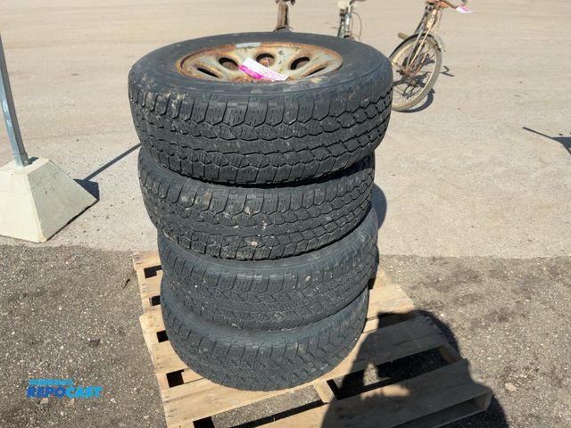 Lot 2-23360 - (4) Used Firestone Destination A/T2 Size 245/70R17 Tires on Steel 6-lug Wheels, off Chevrolet Silver...
