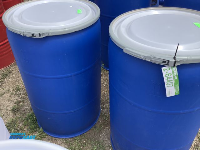 Lot 2-64407 - lot of 2 55 gallon blue plastic barrels with removable lids and locking rings, clean inside, contain...