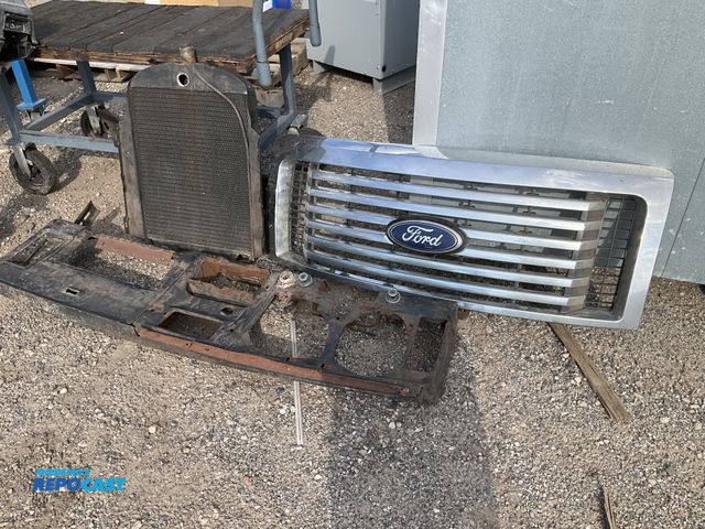 Lot 2-25061 - Ford truck grill, Ford Model T Radiator from vintage Ford mustang Dash fits 1971-73 models original