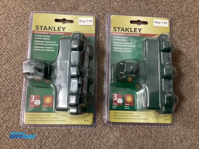Lot 2-77675 - New Two new Stanley Plugmax green outdoor 3-outlet covered adapters.