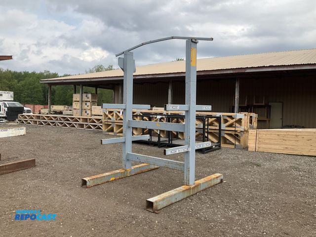 Lot 2-34492 - Two sided metal cantilever rack 68-1/2”W x 84” x 108”T overall, 24” long rack arms, used