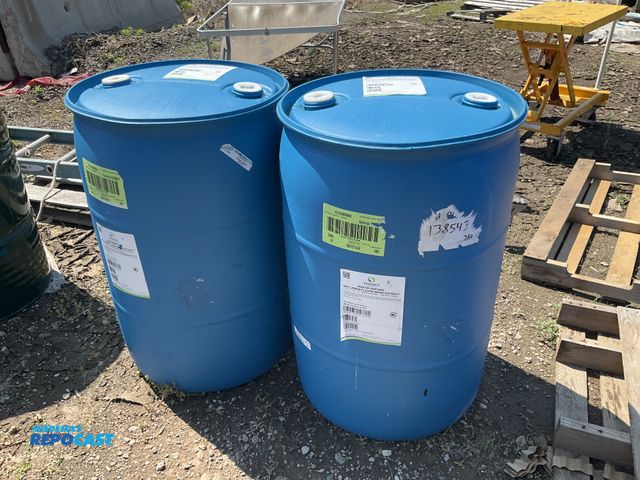 Lot 2-99358 - (2) 55 gallon blue plastic barrel w/ (2) removable bungs - contained lemon juice
