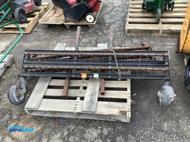 Lot 2-93541 - Skid lot of (2) rollable agricultural rake attachments approx. 61.5” long