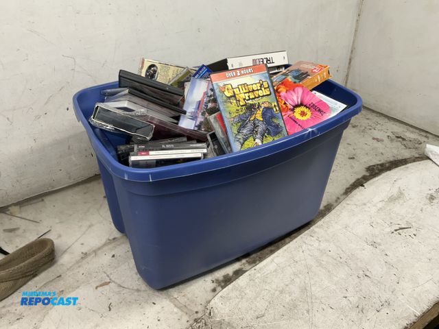 Lot 2-27322 - tote of CD's and videos