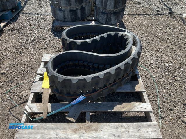 Lot 2-91992 - Lot of (1) Caterpillar Rubber Skid Steer Track 300 X 52.5 x 84 Skid Steer
