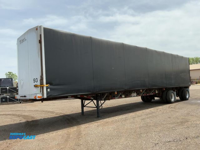 Lot 2-11980 - 2005 Transcraft 48’ Flatbed Semi Trailer with Rolling Tarp System