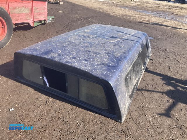Lot 2-33609 - Fiberglass truck topper for a long box pickup