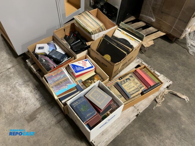 Lot 2-96547 - Skid Lot of Assorted Tablets, TV Remotes, Records, and Books