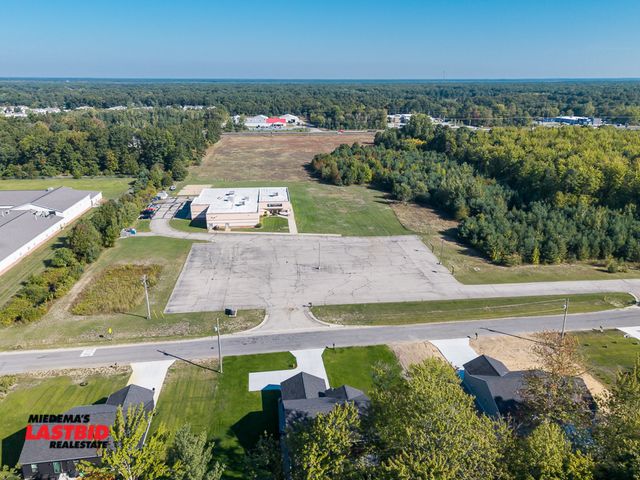 Church Building and 4 Vacant Parcels Selling Separately or Together in Muskegon, MI