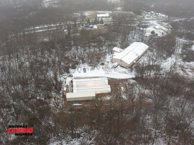 Multi-Parcel Auction of a 10,789 SF Commercial Building and Cannabis Greenhouse Facility Selling Separately