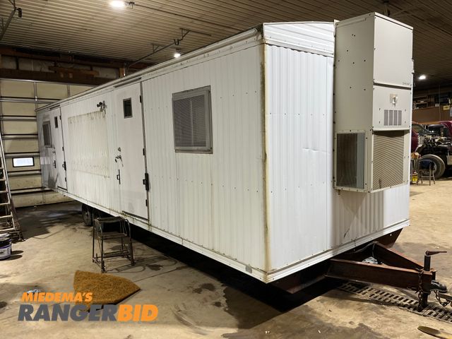 Lot 30-420 - Tyson Corporation Mobile Office 10' x 32' Comes with aluminum stair case, outlets, lights, desks, ch...