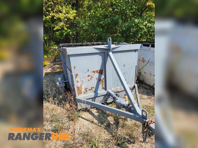 Lot 30-1001 - Lot of (4) Towable Dumpsters This is not a titled item. Municipality owned. Please note that this is located at the recycle center.