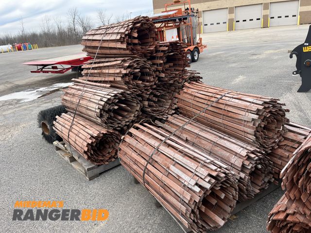 Lot 30-4952 - Pallet of snow fence, each roll is approximately 4' x 50'. ( this includes the 2 piles shown)
