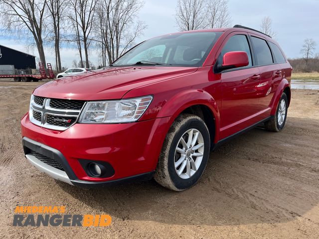 Lot 30-453 - 2014 Dodge Journey with a 3.6L V6 DOHC 24V engine. SXT with 57,082 SUV AWD