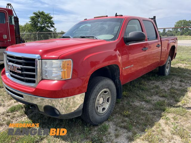 Lot 30-1503 - 2009 GMC Sierra 2500HD with a 6.0L V8 16V OHV engine. with 127,026 miles Double Cab Pickup Truck 4x4